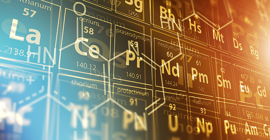 Image of Periodic Table with Organic Compound Structures Overlaid