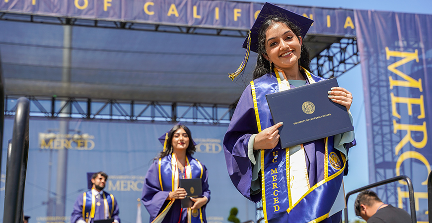 Three students participate in UC Merced's Spring 2022 Commencement.
