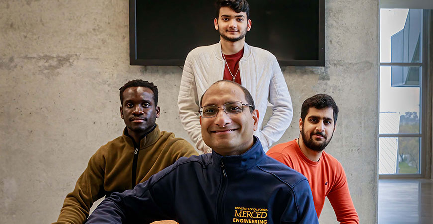 Professor Goyal, front, with several of his students.   