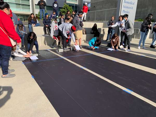 Racers line their solar cars up for a challenge at UC Merced Nov. 5, 2022.