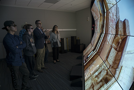Visitors experience the WAVE, a 20-screen, 3-D visualization system.